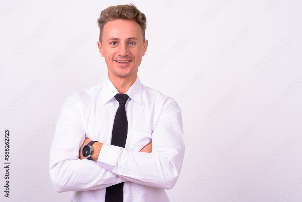 Portrait of happy handsome businessman with blond curly hair Portrait of happy handsome businessman with blond curly hair