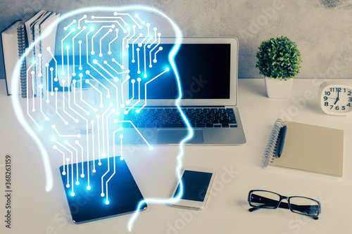 Double exposure of desktop with computer and brain drawing hologram. Artificial intelligence concept.