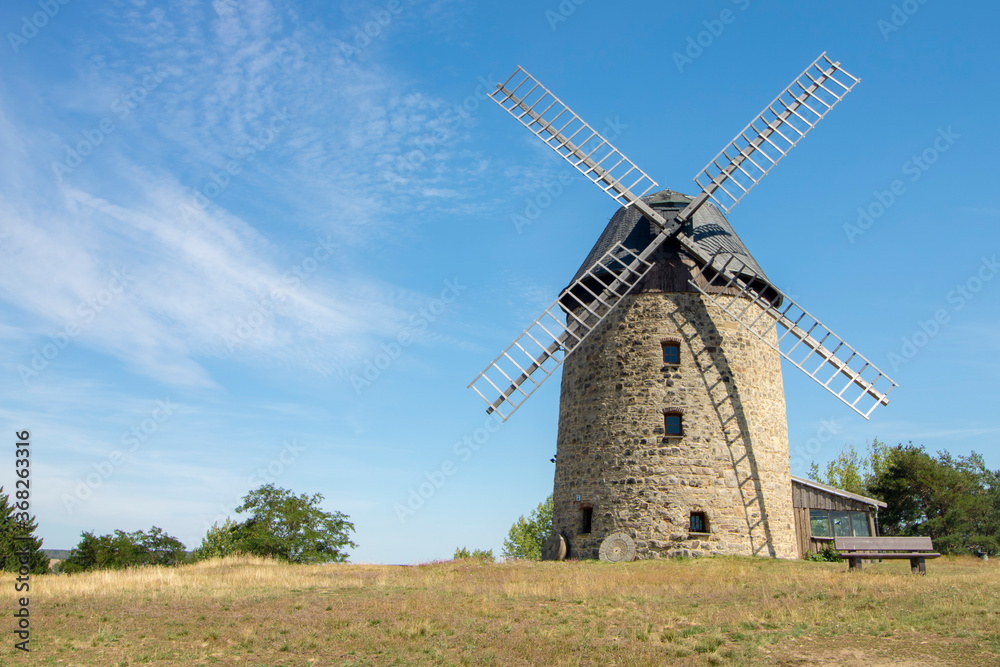 old stone windmill in the countryside near Weddersleben, Germany