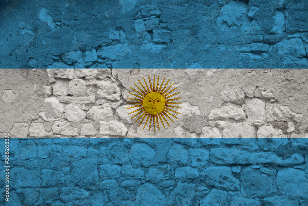 national flag of the state of Argentina on the texture of a rough, old stone wall with cracks, the concept of historical, tourism, emigration, economy, politics, global world trade