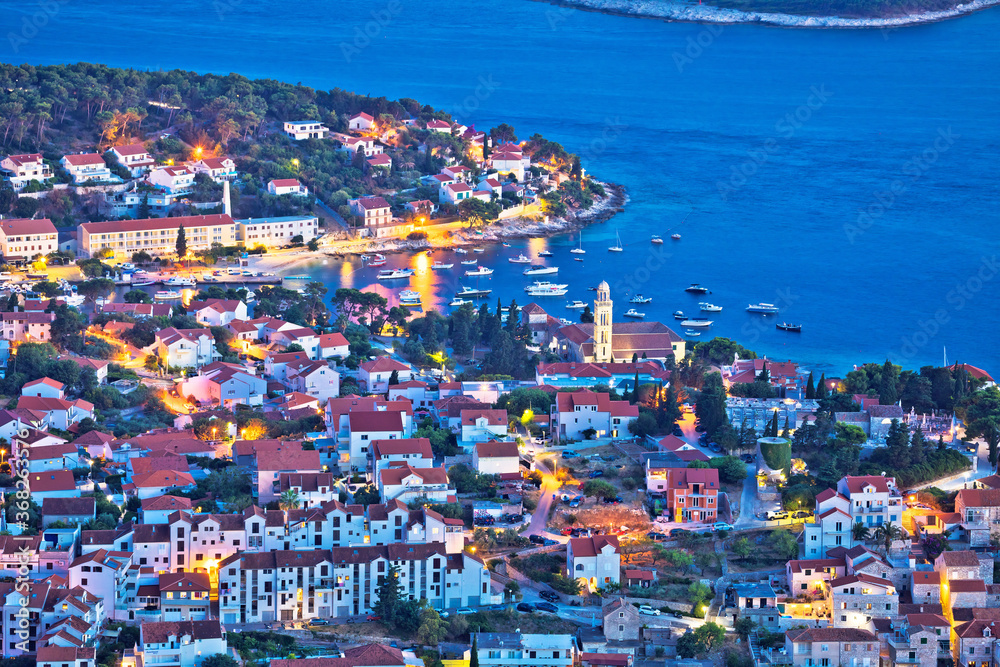 Amazing town of Hvar waterfront aerial evening view