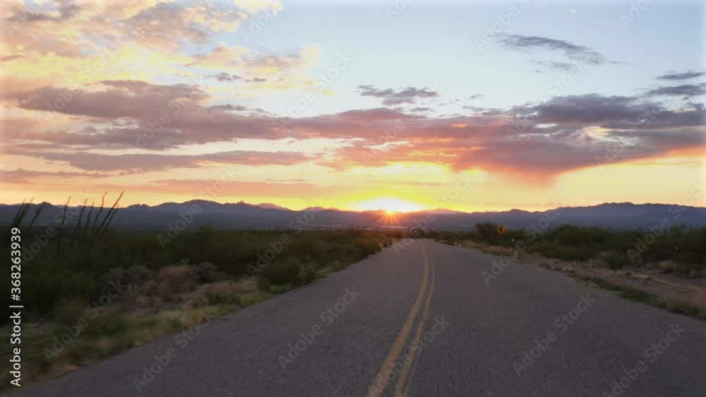 Driving POV into the setting sun Driving POV into the setting sun