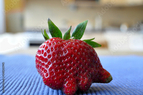 close up of interestingly formed strawberry