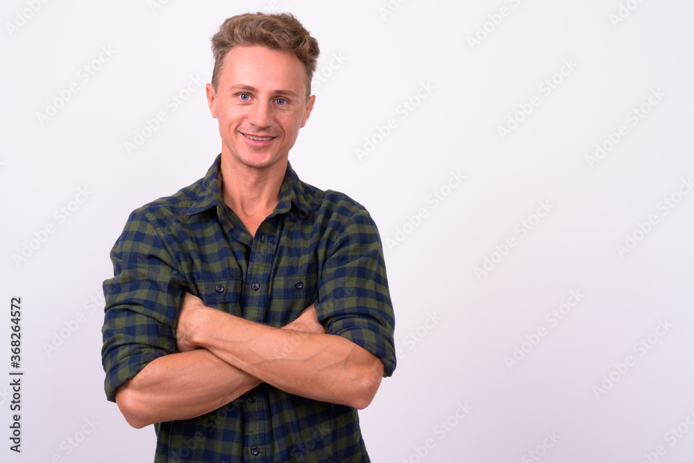 Portrait of happy handsome man with blond curly hair Portrait of happy handsome man with blond curly hair