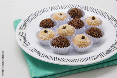 Traditional Brazilian sweet, brigadeiro and beijinho.