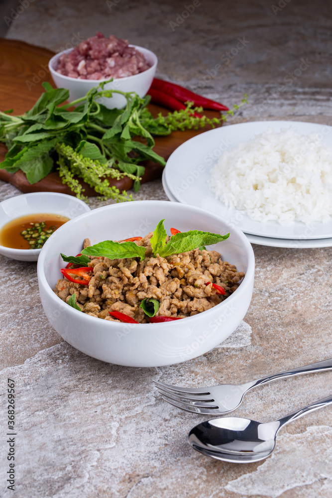 stir-fried pork and basil with rice , Thai famous Street food