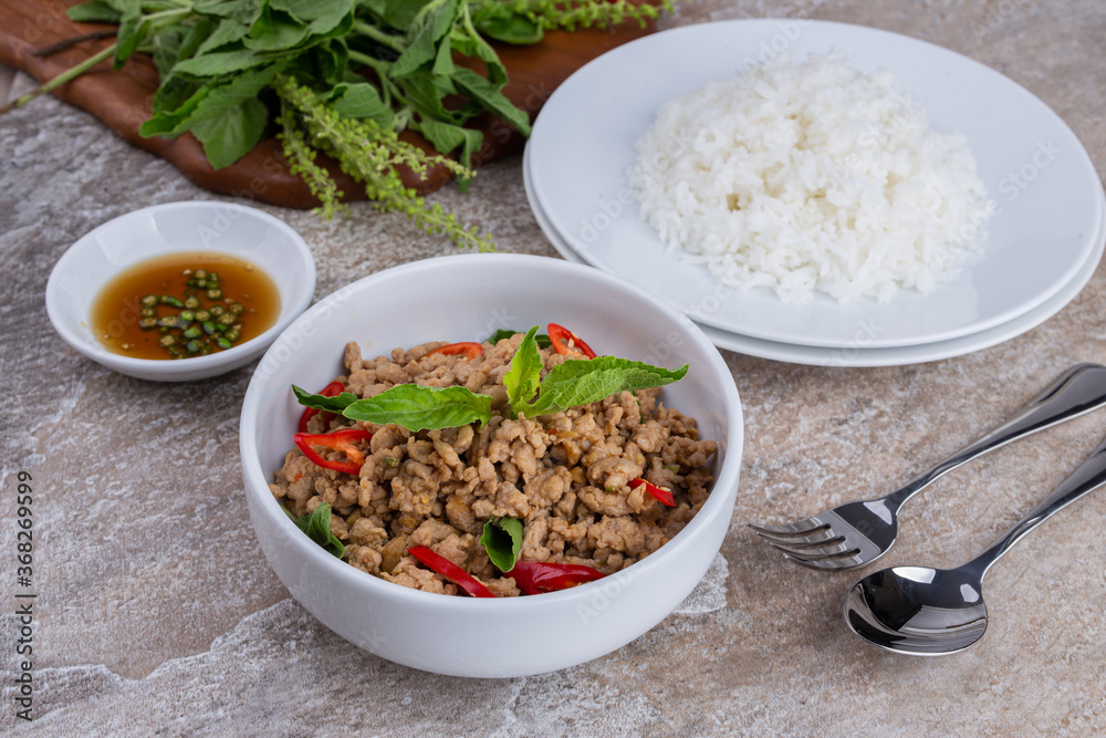 stir-fried pork and basil with rice , Thai famous Street food stir-fried pork and basil with rice , Thai famous Street food