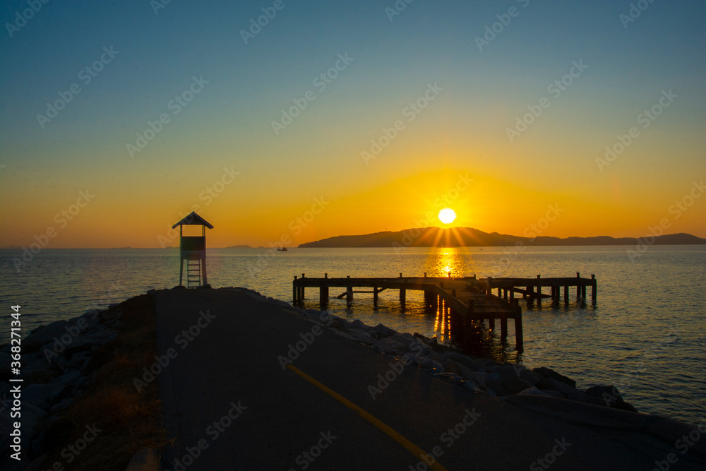 Small white house with morning on the sunset at Khao Laem Ya Thai marine national park. Rayong, Thailand