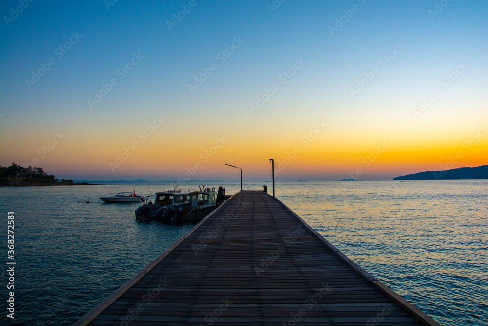 Colorful sunrise seascape rocky shore at Khao Laem Ya Thai marine national park. Rayong, Thailand