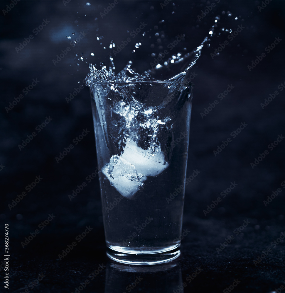 Ice on glass of water Ice on glass of water