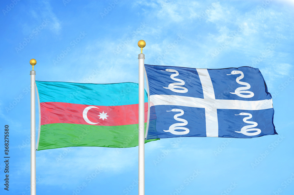 Fototapeta premium Azerbaijan and Martinique snake two flags on flagpoles and blue sky