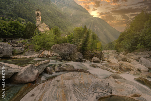 Crystal clear mountain river in the mountains, Switzerland, canton ticino (tessin), Verzascatal (Valle Verzasca). photo