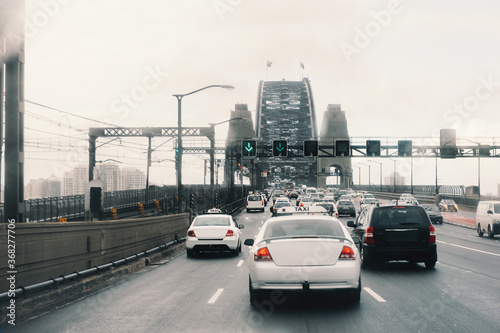 Sydney traffic over the bridge on a gloomy day