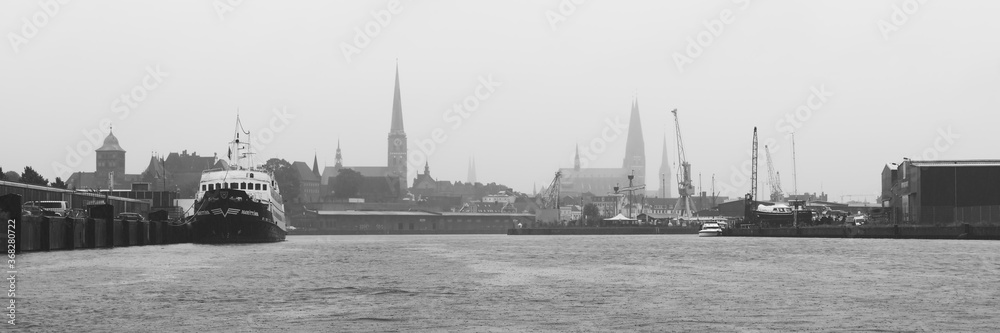 Fototapeta premium Harbor skyline of Lübeck Black and White