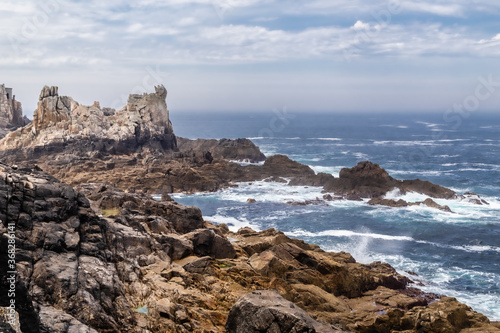 rocky coast of the island of Ouessant, off Brittany photo