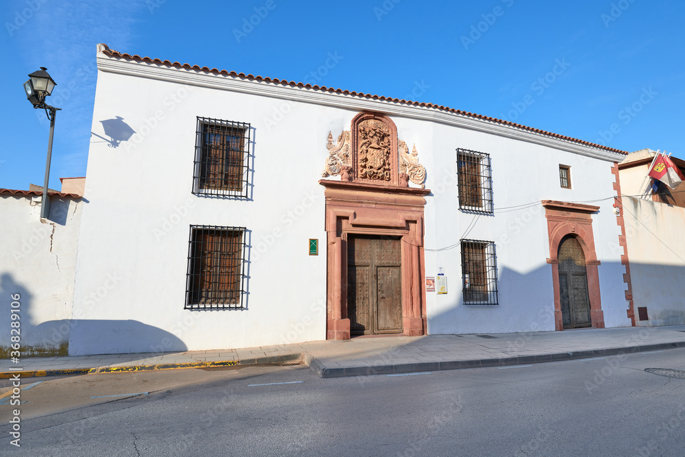 View of the facades of the Sanabria family manor house and the santo Domingo Soriano ermitage, current Alcazar de San Juan city municipal museum, Ciudad Real province, Castilla la Mancha, Spain