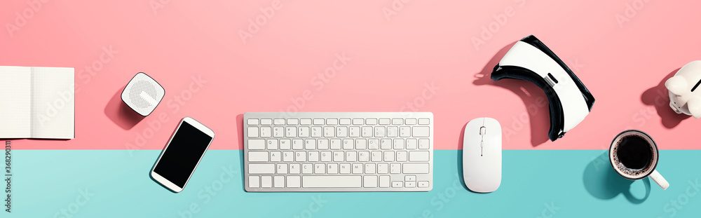 Computer keyboard with digital devices - flat lay Computer keyboard with digital devices - flat lay