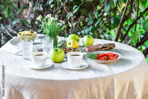 coffee and breakfast on the table outdoor country terrace
food background top view copy space for text organic healthy eating