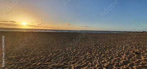 A beautiful sunset at a beach with the sea view in Australia 