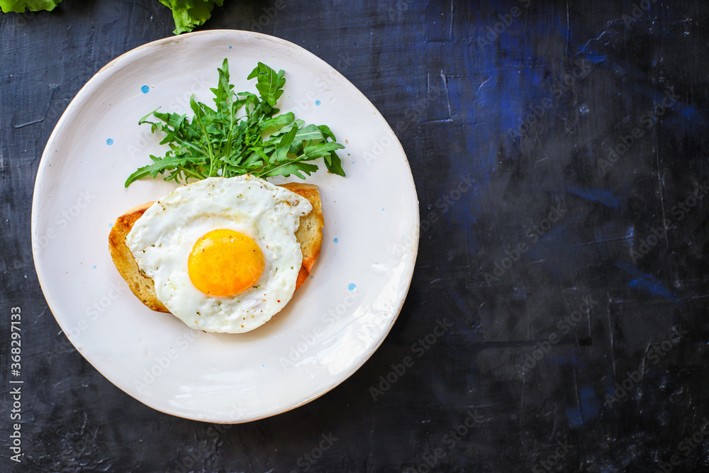 fried egg and toast bread salad delicious breakfast snack yolk and protein portion serving food background top view copy space eating healthy raw Takeaway fried egg and toast bread salad delicious breakfast snack yolk and protein portion serving food background top view copy space eating healthy raw Takeaway