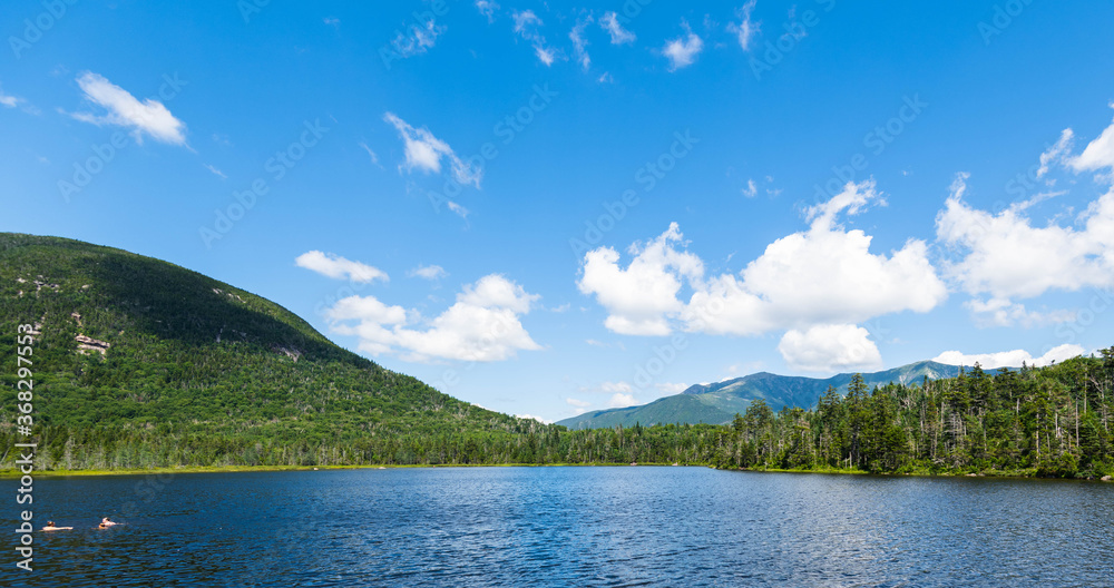 Beautiful blue skies and lake view of Lonesome Lake in the White Mountains of New Hampshire