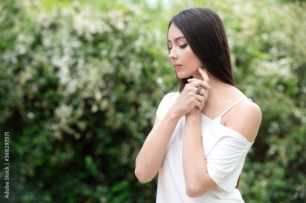 Elegant model poses for the spring catalog of jewelry and accessories Elegant model poses for the spring catalog of jewelry and accessories