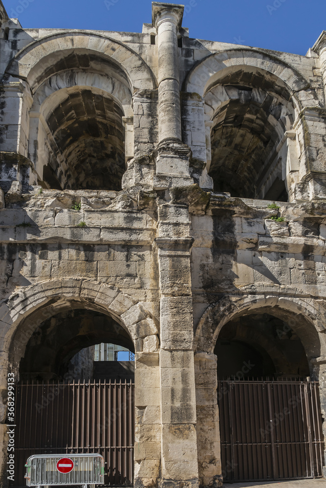 Ancient Nimes Roman Amphitheatre. Nimes Arena (70 CE) - one of the best-preserved amphitheaters in the world. Nimes, Occitanie region of southern France.