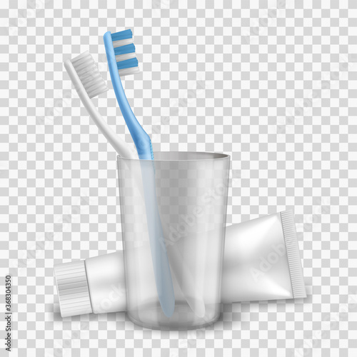 Toothbrushes white and blue are in cup near toothpaste tube mockup. Oral hygiene products.