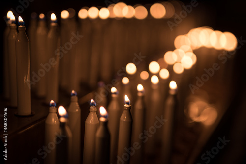 Votive candles in a European cathedral.