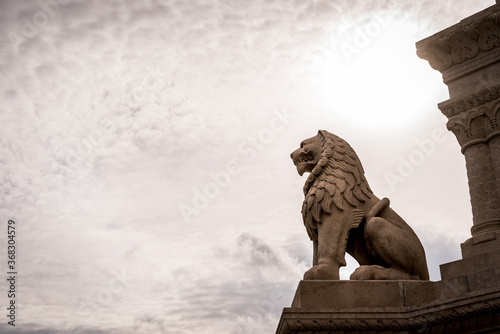 Lion at the base of the Statue of St. Stephen in Budapest, Hungary.