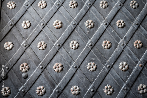 Ornate exterior door decorations in Prague, Czech Republic.