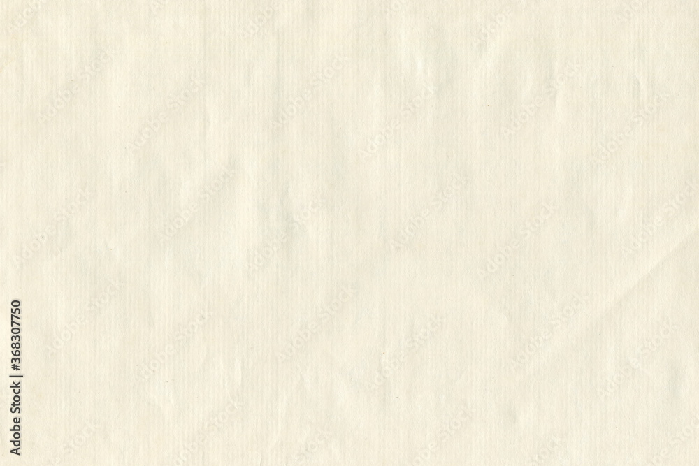 Grunge texture of old paper is yellowish, not very smooth. Abstract monochrome background of yellowish paper. Paper for letters. Grunge texture of old paper is yellowish, not very smooth. Abstract monochrome background of yellowish paper. Paper for letters.