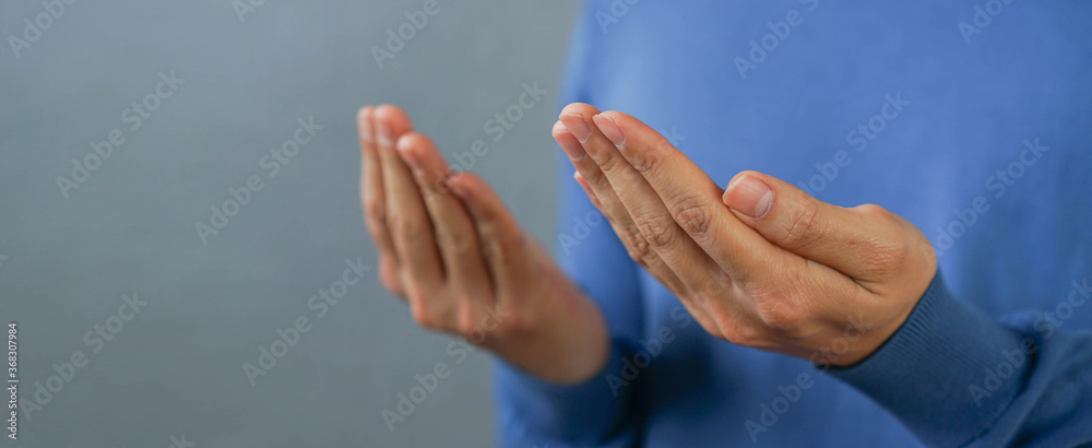 close up adult muslim prayer man hand praying at mosque for religion and culture concept - obrazy, fototapety, plakaty 