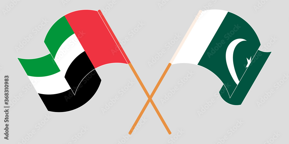 Crossed and waving flags of Pakistan and the United Arab Emirates Crossed and waving flags of Pakistan and the United Arab Emirates