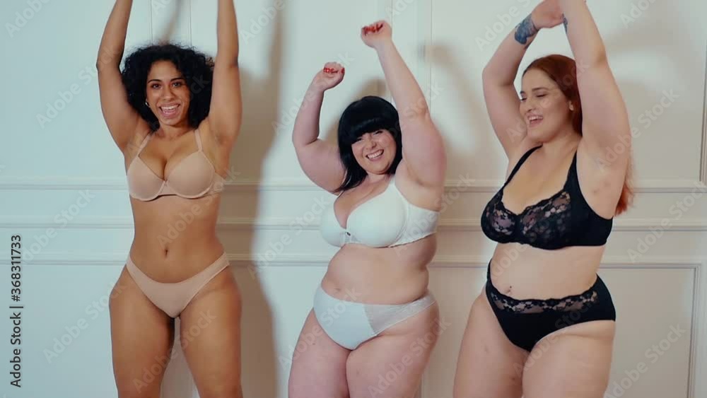 Three women posing for studio portraits. Celebrating and having fun. Concept about lifestyle and body positivity