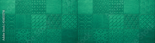 Dark green turquoise vintage retro geometric square mosaic motif cement tiles texture background banner panorama © Corri Seizinger