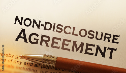 Non disclosure agreement document with pen close-up