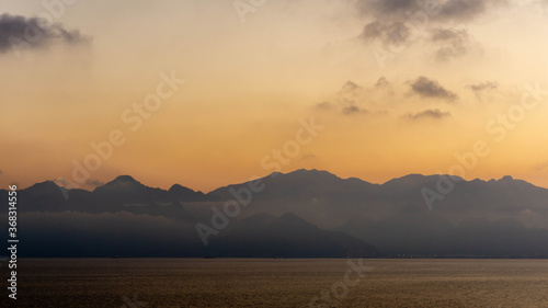 majestic mountains covered with clouds and fog