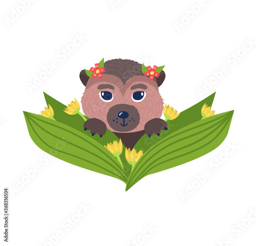 Springtime mood design, cute wild little bear character resting in spring flo...