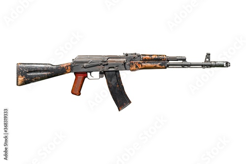 Old used kalashnikov AK 74 assault rifle isolated on white background. photo