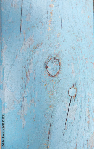 Background from the texture of aged wood painted in blue.