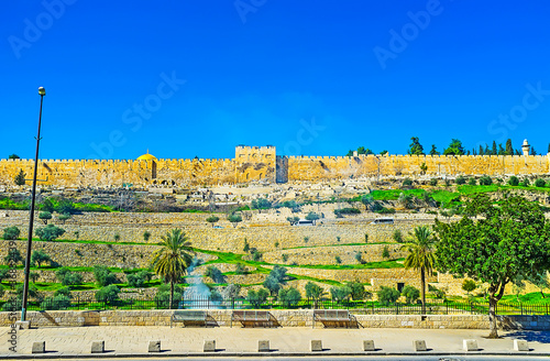 The medieval city ramparts and Kidron Valley, Jerusalem, Israel photo