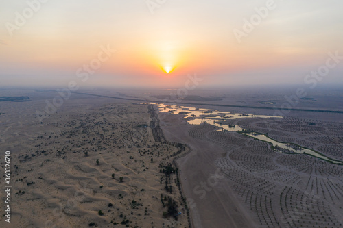 Sunset in Qudra Desert  with artificial man made lakes in Dubai  UAE