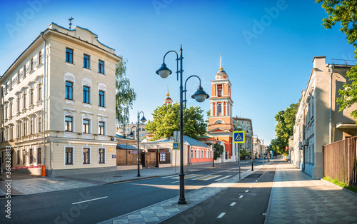 Ancient and modern buildings and the Trinity Church on Pyatnitskaya Street in Moscow