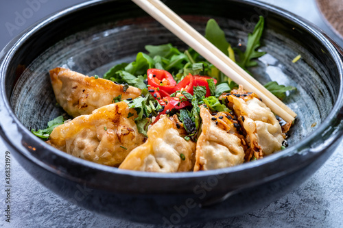 Tasty asian food, homemade deep fried chicken gyoza dumplings