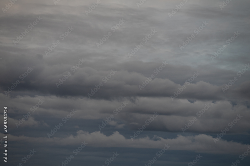 Dark ominous grey clouds. Dramatic sky. Dark ominous grey clouds. Dramatic sky.