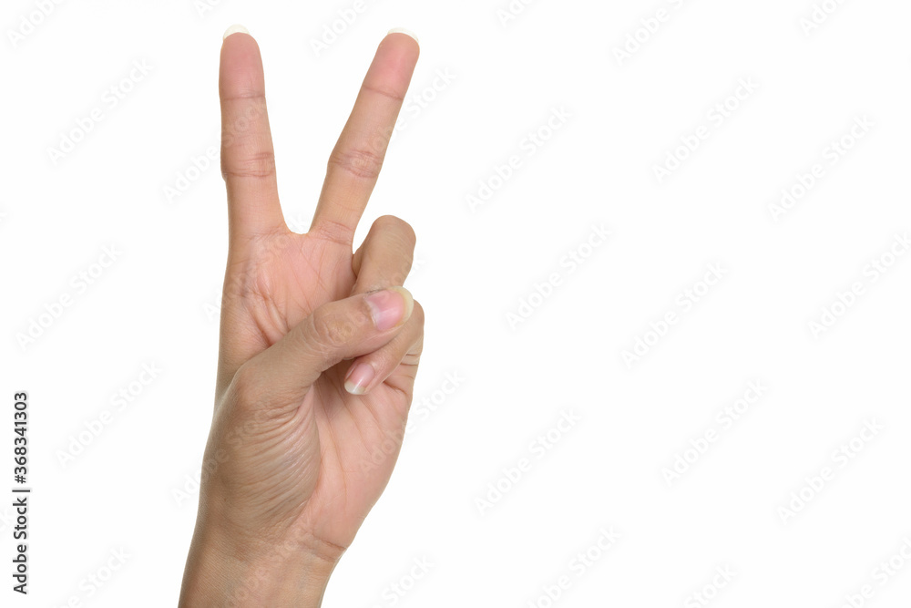 Portrait of hand showing peace sign gesture Portrait of hand showing peace sign gesture