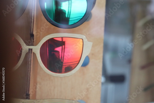 red and blue  - sun glasses - refection