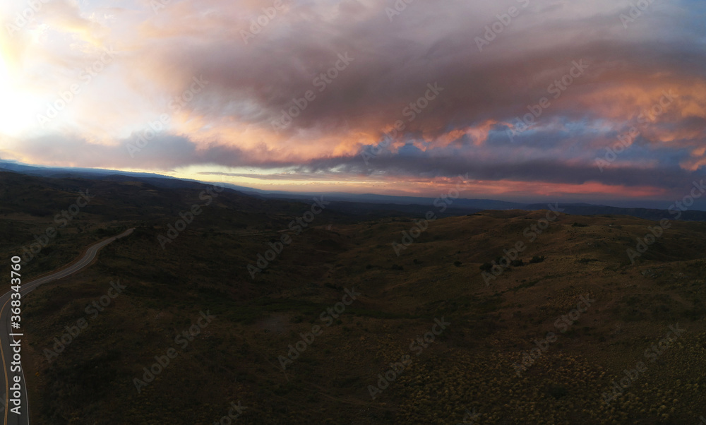 Fototapeta premium sunset in the mountains in the sky aerial photography
