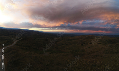 sunset in the mountains in the sky aerial photography